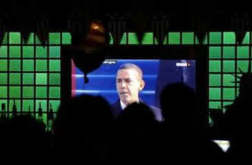  Barack Obama's Inaugural Address on TV at a London Bar where patrons celebrate at inauguration party on January 20, 2009..