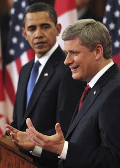 President Barack Obama and Prime Minister Stephen Harper hold a news conference on Parliament Hill after private meetings.