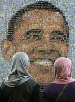 Women look at Obama motif made of stamps at The Jakarta, Indonesia International Stamp Exhibition on November 26, 2008.