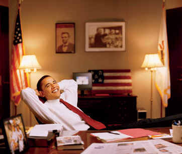 Senator Obama relaxes in his Capitol Hill office in the fall of 2002. Behind Obama are photos of President Abraham Lincoln and Martin Luther King Jr.