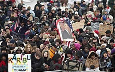 President Obama is greeted by several thousand supporters who braved the cool snowy weather in Ottawa to get a glimpse of the popular President. For security reasons the crowds were well back of the arriving Obama motorcade.