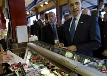 President Barack Obama's motorcade makes an unscheduled stop at an Ottawa market. President Obama purchases Canadian maple leaf cookies at a bakery and Ottawa key rings from a novelty store. The bakery store owner would not accept $20 Canadian from President Obama, asking Obama to give the cookies to his daughters.