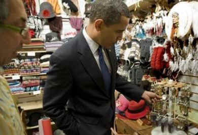 President Barack Obama's motorcade makes an unscheduled stop at an Ottawa market. President Obama purchases Ottawa key rings from a novelty store at market near the US Embassy in Ottawa.