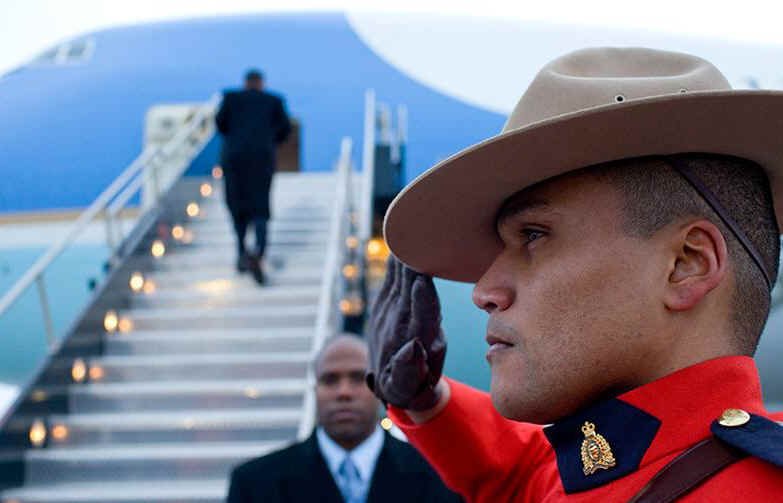  President Obama departs Ottawa on Air Force One as a Royal Canadian Mounted Police officer salutes. President Barack Obama packs a busy schedule for his one-day visit to Ottawa, Canada on February 19, 2009.