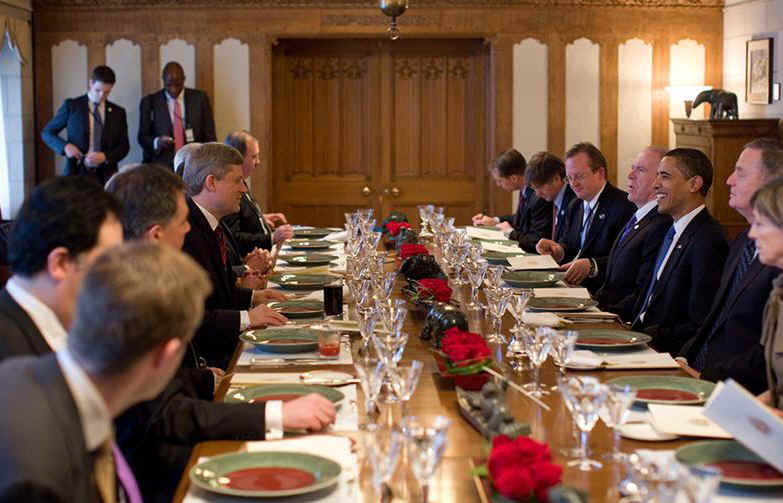 President Obama and Stephen Harper talk during Parliament Hill luncheon. Lunch included bison, carp, and wild berries.