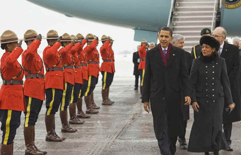 President Obama is greeted at the airport by Canadian governor General Michaelle Jean and RCMP officers. President Barack Obama packs a busy schedule for his one-day visit to Ottawa, Canada on February 19, 2009.