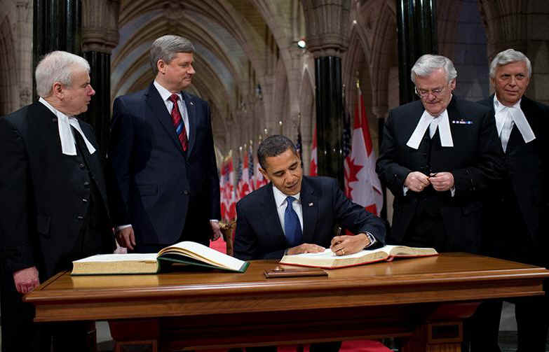 President Obama signs the Guest Book shortly after arriving on Parliament Hill for meetings with Canadian PM Harper.