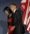 Barack Obama walks off the stage with Michelle after delivering a memorable and historic speech in front of a huge Chicago crowd and a worldwide TV audience on November 4, 2008.