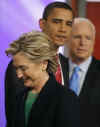 Barack Obama battles Hillary Clinton and John McCain on the road to the White House. Photos and images of Barack Obama during Obama's 2008 presidential campaign. Obama's campaign theme was Change, Photo: Hillary Clinton, Barack Obama, and John McCain at NH presidential debates in early 2008. Campaign news and photos of the 2008 Barack Obama presidential campaign.