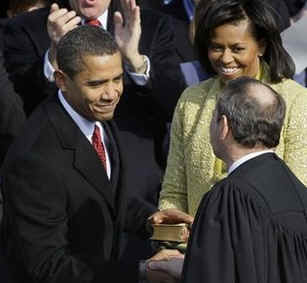 Watch the Official White House YouTube of the Presidential Oath of Office Given by Justice Roberts and the Inaugural Address. Photo: Michelle Obama holds Lincoln Bible from 1861 Inauguration for swearing in ceremony of President Barack Obama.