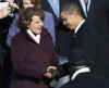 Barack Obama is congratulated by Senator Feinstein, George W. Bush, and Vice President Joe Biden after oath.