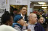 Barack Obama mingles with the diners at Ben's Chili Bowl Restaurant between lunch with Washington Mayor Adrian Fenty.