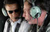 Barack Obama travels by helicopter with General David Petraeus after landing at Baghdad International Airport.