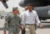 Senator Barack Obama travels with General David Petraeus after landing at Baghdad International Airport on July 21, 2008.