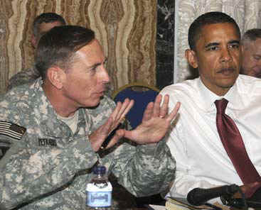 Senator Barack Obama travels with General David Petraeus after landing at Baghdad International Airport on July 21, 2008.
