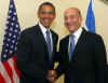 Barack Obama meets current Israeli PM Ehoud Olmert in Jerusalem.