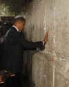In both Hebrew and Arabic Barack means "Blessed" or "Blessed One". Photo: Barack Obama places a message in the cracks of the stone blocks of Jerusalem's West Wall in the early morning of July 24, 2008.
