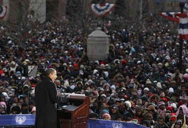 Obama delivers a speech to thousands of supporters in Baltimore. Barack and Michelle Obama, and Joe and Jill Biden, arrive via train in Baltimore. Obama gives a speech at the Baltimore City Hall in the War Memorial Plaza and then continues his journey to Washington and his temporary residence at Blair House. Michele Obama celebrated her 45th birthday on January 17, 2009. Michele Obama was presented a birthday cake on the train.