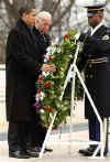 Barack Obama and Joe Biden lay a wreath at the Tomb of the Unknown Soldiers at Arlington National Cemetery in Arlington, Virginia. Major general Richard Rowe escorted President-elect Obama and Vice President-elect Biden.