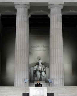 Obama has often posed or spoken in front of two pillars or columns. These pillars appear as the number 11. Obama speaks between twin pillars at the pre-inauguration ceremonies on January 18, 2009 at the Lincoln Memorial.