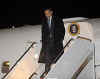 Barack Obama arrives at Andrews Air Force Base in Maryland aboard a 757 military charter on January 4, 2009 enroute to see family at hotel in Washington, DC.