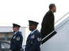 Barack Obama boards from Chicago Midway Airport for Washington via Andrews Air Force Base aboard a 757 military charter on January 4, 2009.