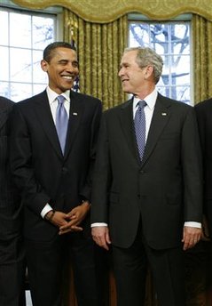 President George W. Bush and President-elect Barack Obama with former Presidents George Bush Sr., Bill Clinton, and Jimmy Carter. President-elect Barack Obama poses for the cameras with the the four living US Presidents in the Oval Office of the White House on January 7, 2009.