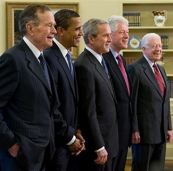 President George W. Bush and President-elect Barack Obama with former Presidents George Bush Sr., Bill Clinton, and Jimmy Carter. President-elect Barack Obama poses for the cameras with the the four living US Presidents in the Oval Office of the White House on January 7, 2009.