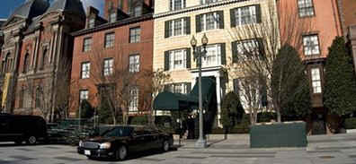 Secret Service vehicles guard the entrance to Blair House where the Obama family moves to on January 15, 2009.