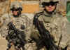 Obama's campaign policies on foreign policy included increased US forces in Afghanistan. President Obama assigns Defense Secretary Gates to recommend a plan for Afghanistan.In 2007 111 Americans were killed in the Afghanistan war. Photo: US soldiers at village near Bagram airbase in Afghanistan on January 30, 2009.