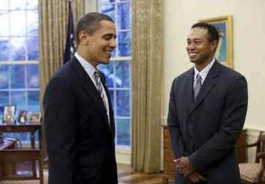 President Barack Obama meets with golf star Tiger Woods in the Oval Office during a White House Press Conference.
