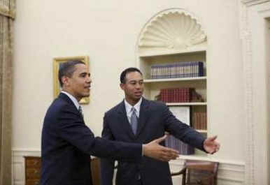 President Barack Obama meets with golf star Tiger Woods in the Oval Office during a White House Press Conference.