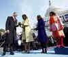 President Barack Obama and family inspect the 1861 Lincoln Bible after the swearing-in ceremony on Capitol Hill on January 20, 2009.