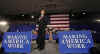 President Barack Obama speaks then answers questions from the audience at a town hall style meeting at Concord Community High School in Elkhart, Indiana. Questions were focused on the economy and the President's stimulus package.