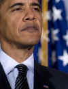 President Barack Obama attends the swearing in of Treasury Secretary Timothy Geithner, performed by Vice President Joseph Biden, at the Treasury Department in Washington on January 26, 2009.