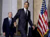 President Barack Obama attends the swearing in of Treasury Secretary Timothy Geithner, performed by Vice President Joseph Biden, at the Treasury Department in Washington on January 26, 2009.