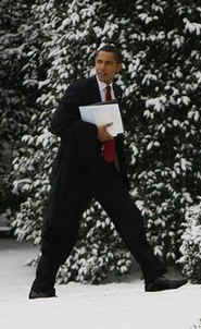 President Obama treks from meetings at the Capitol after a snowy day in Washington, and a busy day for Obama at the Capitol. President Obama later leaves the White House for the Eisenhower Executive Building next to the White House.