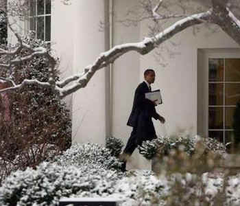 President Obama treks from meetings at the Capitol after a snowy day in Washington, and a busy day for Obama at the Capitol. President Obama later leaves the White House for the Eisenhower Executive Building next to the White House.