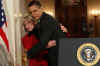 President Barack Obama signs his first bill into law as president in the East Room of the White House on January 29, 2009. President Obama signs the Lilly Ledbetter Fair Pay Act designed to eliminate pay inequities based on sex discrimination. Members of Congress. Hillary Clinton, and others join in witnessing the historic moment of Obama's signing of his first bill.