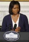 Michelle Obama hosts a function in the State Dining Room of the White House for Lilly Ledbetter after the historic signing of a bill in her name