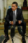 President Barack Obama meets with the press in the Oval Office of the White House. With Treasury Secretary Timothy Geithner at his side, Obama was visibly upset with Wall Street's recent multi-billion dollar bonuses to top executives. President Obama called Wall Street bonuses as "shameful" and irresponsible.