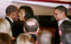 President Barack Obama and First Lady Michelle Obama attend the Grand Re-Opening of Ford's Theatre in Washington on February 11, 2009. President Obama meets a Lincoln actor, receives a copy of the Gettysburg Address, and speaks just below the box where President Abraham Lincoln was shot. Photo: The President and First Lady meet actor Sidney Poitier.