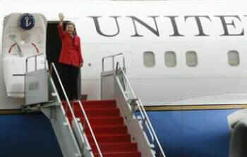 Secretary of State Hillary Clinton arrives in Jakarta, Indonesia and is greeted by elementary students from President Barack Obama's former Indonesian school when he lived in Jakarta with his mother in the early 1970s.