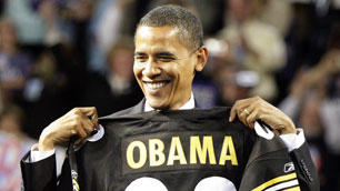 Barack Obama holds a Pittsburgh Steelers NFL jersey with his name during the 2008 election campaign. The owner of the Steelers supported Obama's campaign.