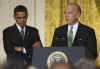 President Obama waits for introduction from VP Joe Biden before speaking to America's city mayors at the Conference of Mayors held in the East Room of the White House. President Obama discussed the responsibility of mayors to ensure stimulus money is spent without corruption.