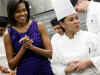 First Lady Michelle Obama meets with White House Executive Chef Cristeta Comerford (photo) and the White House kitchen staff to preview the meals for the Governors Dinner in the State Dining Room later that evening. 
