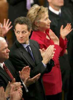 Hillary Clinton and Tim Geithner applaud President Barack Obama after he addresses the Joint Session of Congress at the Capitol in Washington on February 24, 2009.