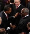 President Barack Obama meets attendees before he addresses the Joint Session of Congress at the Capitol in Washington on February 24, 2009.