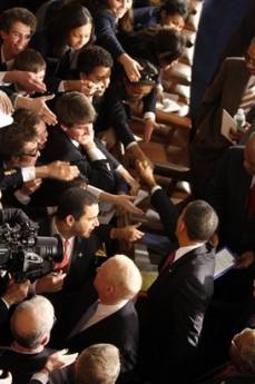 President Barack Obama meets attendees after he addresses the Joint Session of Congress at the Capitol in Washington on February 24, 2009.