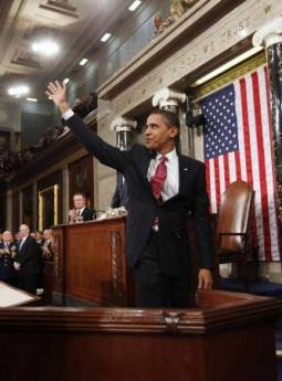 President Barack Obama waves after he addresses the Joint Session of Congress at the Capitol in Washington on February 24, 2009.